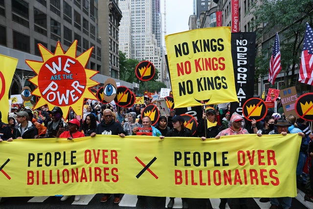 People march in the "No Kings" protest along Fifth Avenue on June 14, 2025 in New York, New York. 