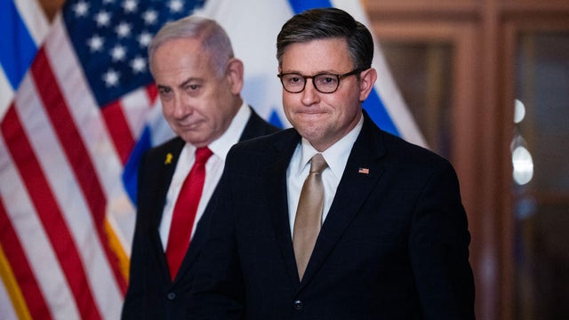 Speaker of the House Mike Johnson, right, and Israeli Prime Minister Benjamin Netanyahu, arrive to address the media after a meeting in the U.S. Capitol on Friday, February 7, 2025. 
