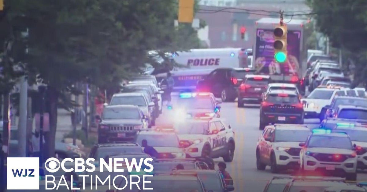 Armed suspect shot by Baltimore Police officer, one officer shot on foot