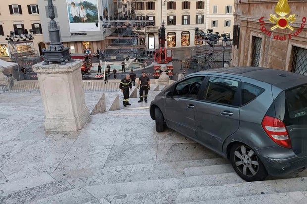 An image made available June 19, 2025, by the Italian firefighters shows a car that was driven by mistake by a man down the Spanish Steps in Rome early on June 17, 2025.