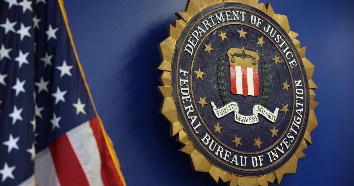 FBI veteran alleges he was fired for displaying Pride flag
