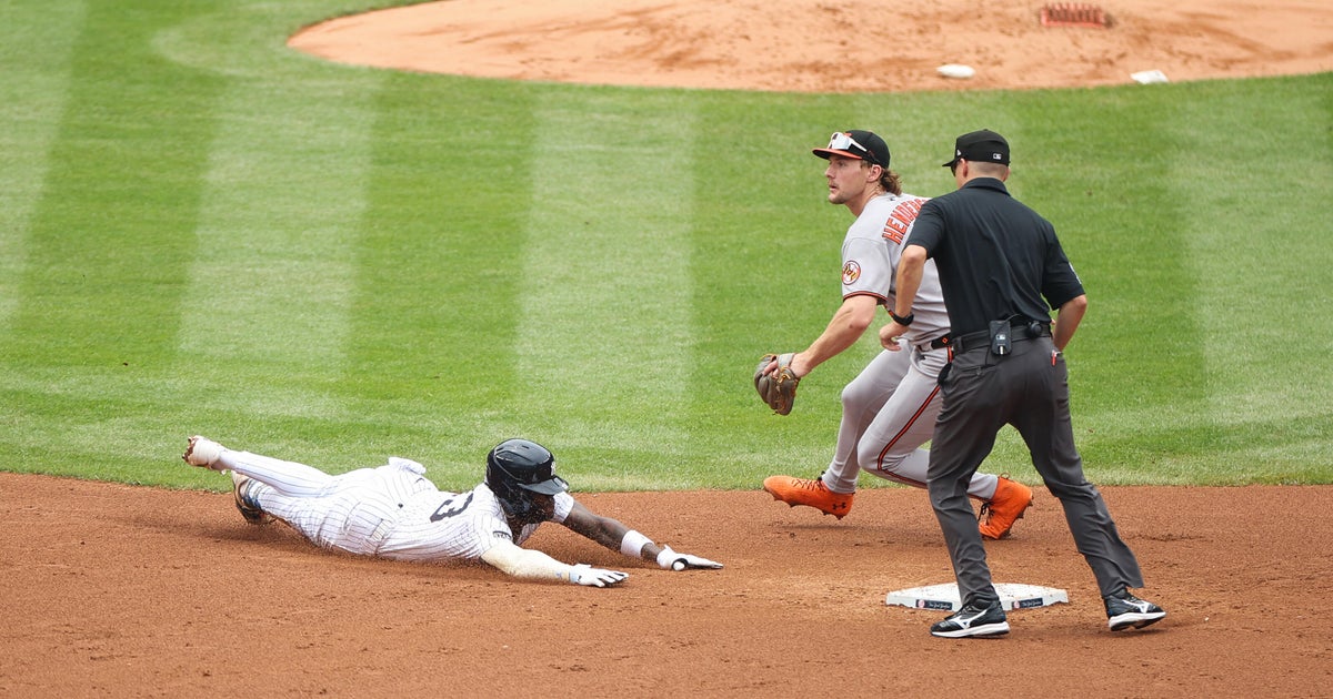 Bats come alive late, Yankees take rubber game against Orioles 