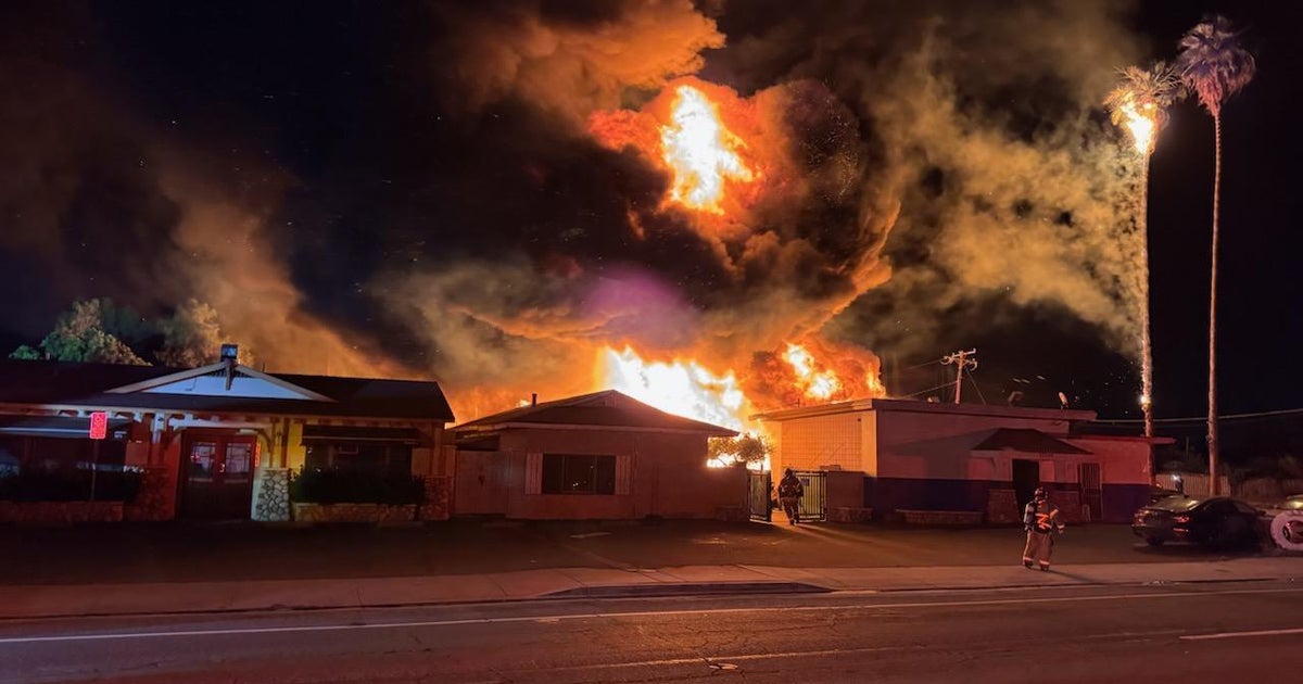 Four buildings damaged as massive fire spreads from Menifee tire lot 