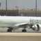 American Airlines flight makes emergency landing as flames, smoke shoot from engine