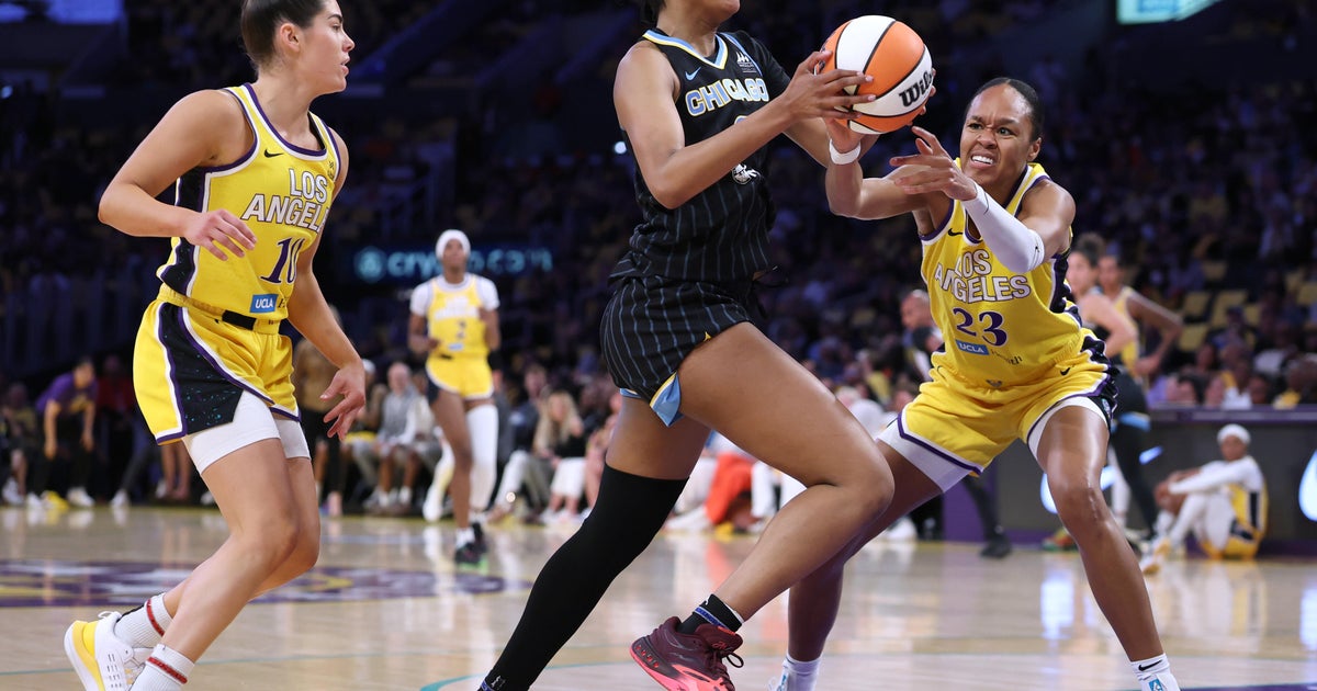 Angel Reese tops 15 rebounds for record 4th straight game as Sky beat Sparks 