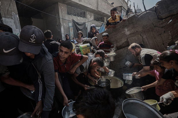 Food distributed to Palestinians fighting hunger in Gaza 