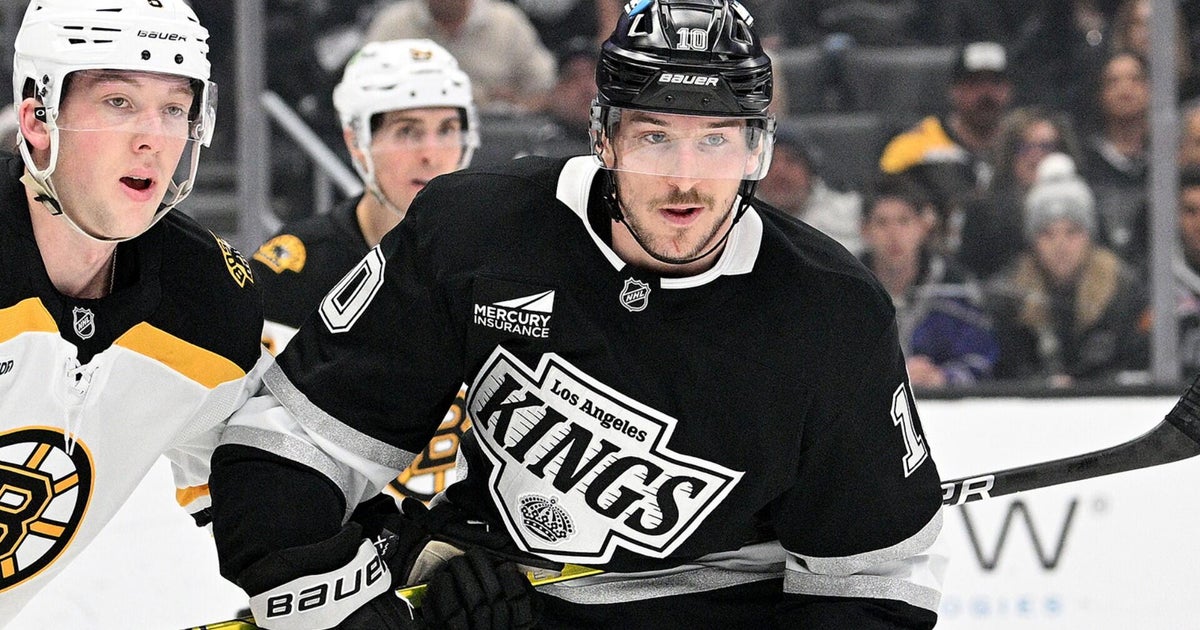 Who did the Bruins sign on the first day of NHL free agency? 