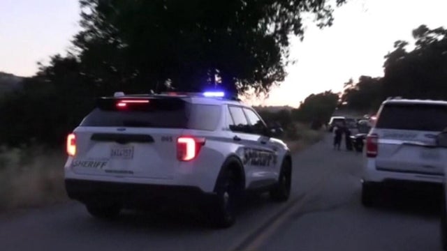 Generic police lights and yellow police tape at crime scene 