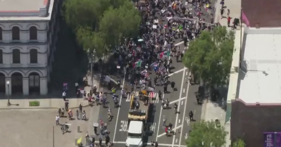 Immigration enforcement protesters take to downtown LA streets on July 4th 