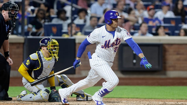 Juan Soto #22 of the New York Mets follows through on his sixth inning RBI base hit against the Milwaukee Brewers at Citi Field on July 03, 2025 in New York City. 