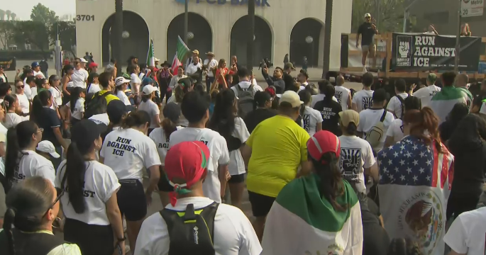 Thousands gather in Los Angeles for 15-mile "Run Against ICE"