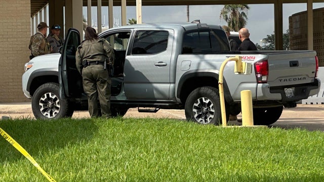 MCALLEN, TX - JUNE 25: A Border Patrol vehicle stops on a farm 