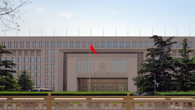                        China says spy plots foiled, including 