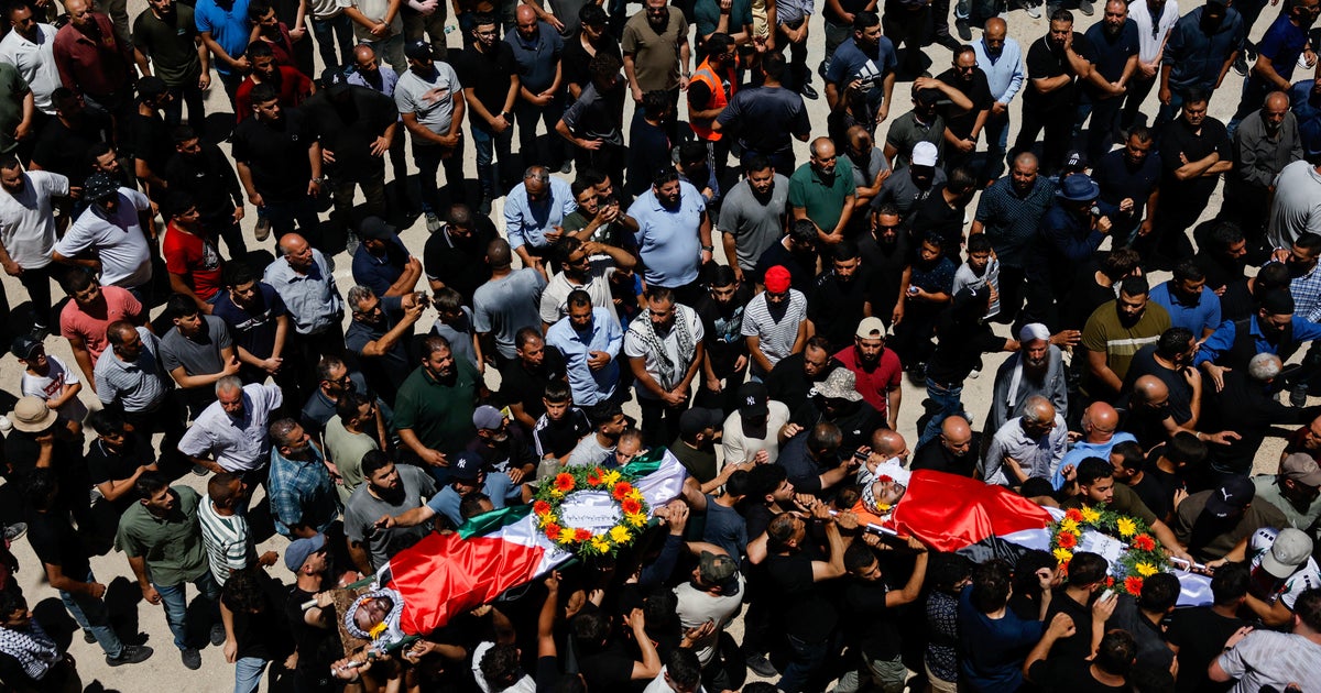 Funeral held for Palestinian-American killed in West Bank as Gaza ceasefire talks drag on