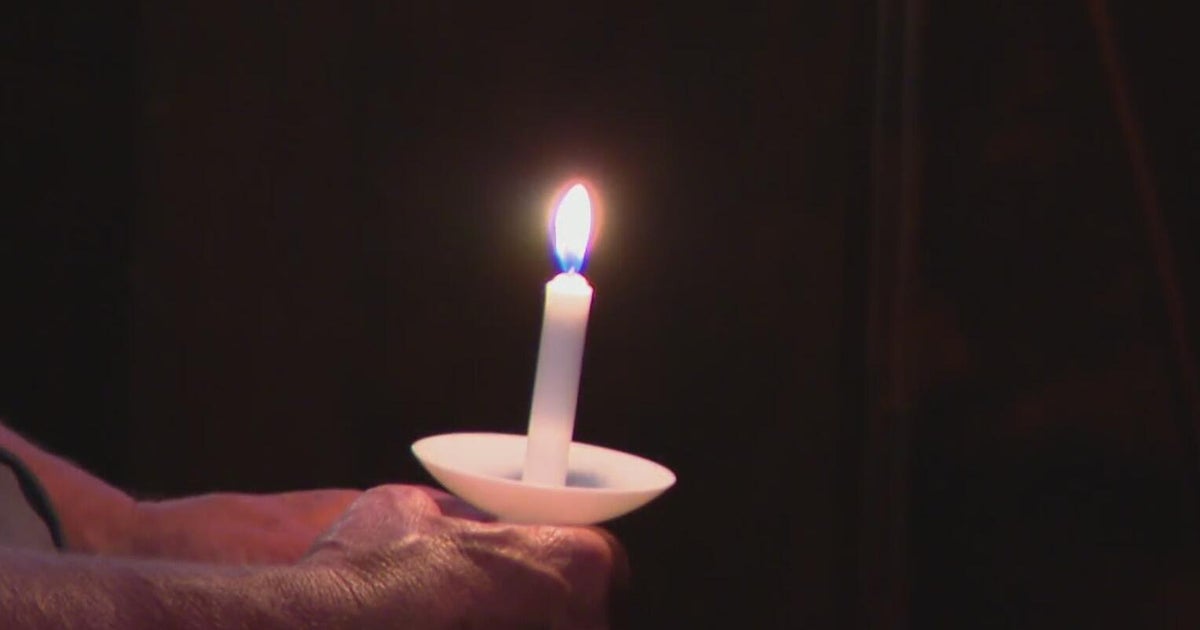 North Texas community honors flood victims with candlelight vigil 