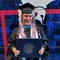 A custodian earns 4 degrees and a mailman rescues his favorite dog
