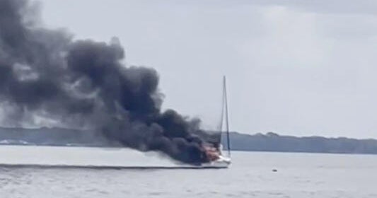 Florida father, son rescue family of 5 and dog from burning sailboat 