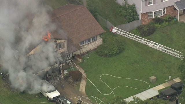 Overhead photo of house fire in Cherry Hill, heavy smoke and flames are seen 