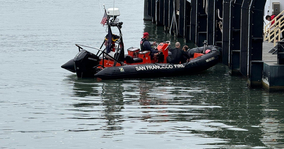 SF rescue crews help person in distress near Ferry Building pier 