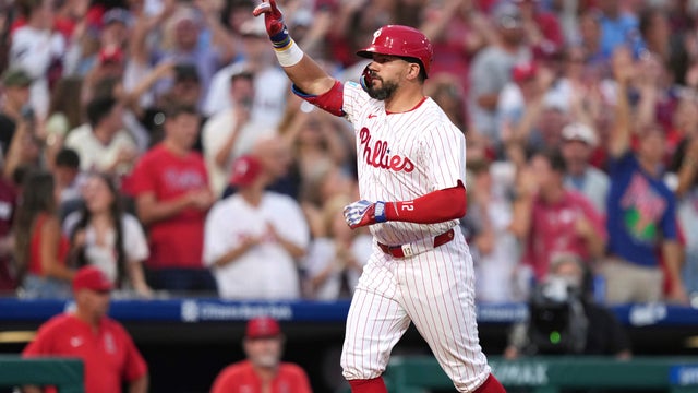 Philadelphia Phillies' Kyle Schwarber reacts after hitting a grand slam against Los Angeles Angels pitcher José Fermin during the sixth inning of a baseball game at Citizens Bank Park in Philadelphia 