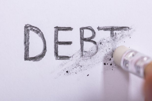 Pencil Eraser Erasing Debt Word