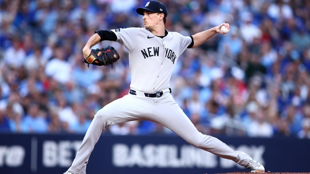 Max Fried #54 of the New York Yankees delivers a pitch in the first inning during the game against the Toronto Blue Jays at Rogers Centre on July 23, 2025 in Toronto, Ontario, Canada. 
