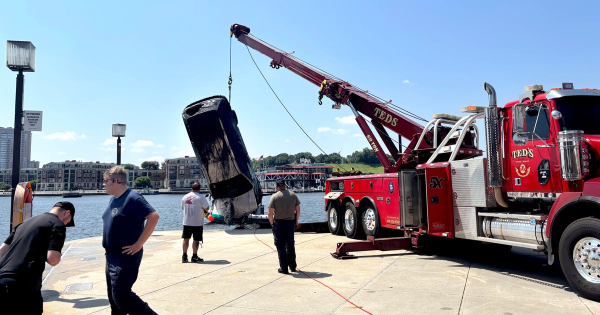 Body found in van removed from Baltimore's Inner Harbor 
