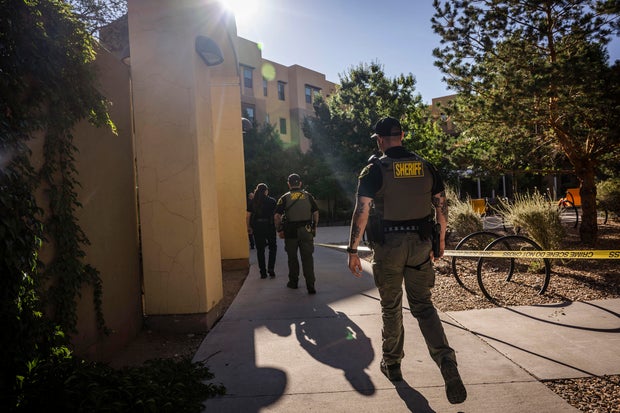 Authorities investigate a deadly shooting at Casas del Rio (Gila), a student housing center at the University of New Mexico Central Campus, July 25, 2025, in Albuquerque, New Mexico. 