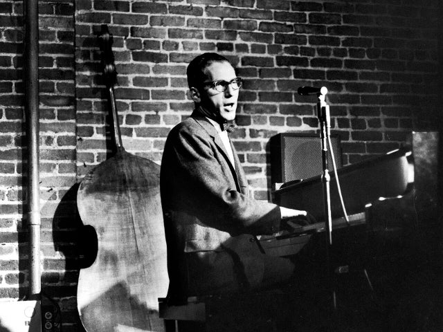 Political satirist and musician Tom Lehrer perform 