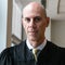 Why DOJ is going after a federal judge who criticized Trump's immigration policy