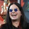 Ozzy Osbourne speaks with reporters during a news conference at his home in Beverly Hills, California, Feb. 18, 2003. 