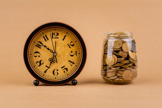 Saving coins in a piggy bank, financial income and financial investment, cash flow from working to earn money 