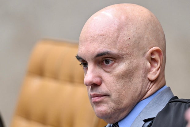 Judge Alexandre de Moraes looks on during a trial of the regulation of social networks at the Brazilian Supreme Court in Brasilia on June 4, 2025. 