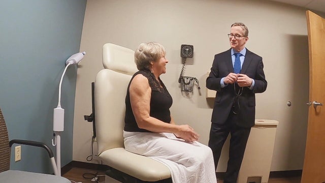 Patient and doctor speak in an exam room at Virtua Health 