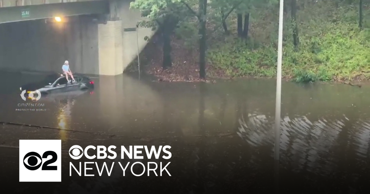 NYC cleaning up from another heavy rain that flooded streets and ...