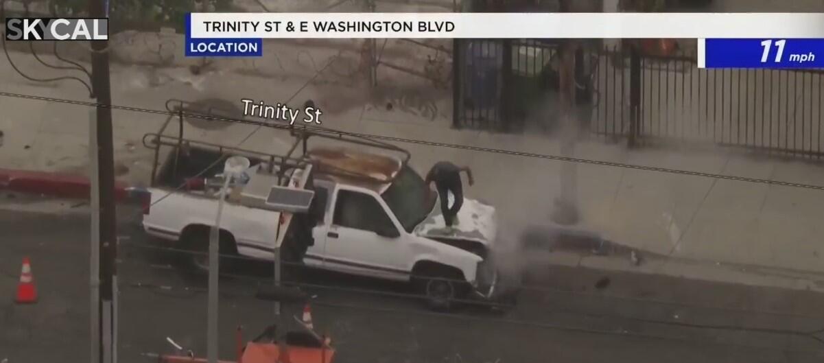 Downtown LA pursuit suspect crashes into vehicle, flips car - CBS Los ...