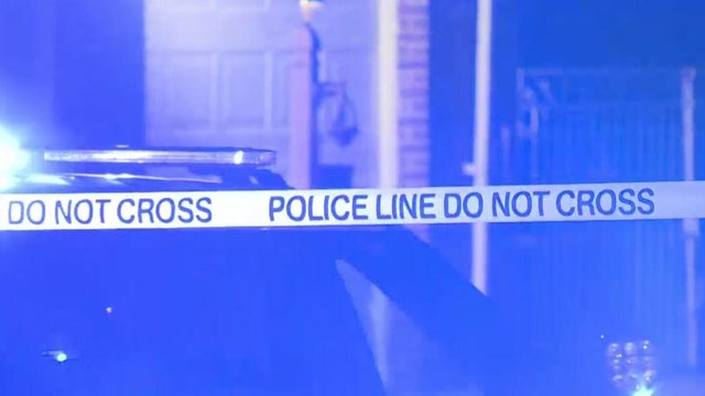Generic police lights and yellow police tape at crime scene 