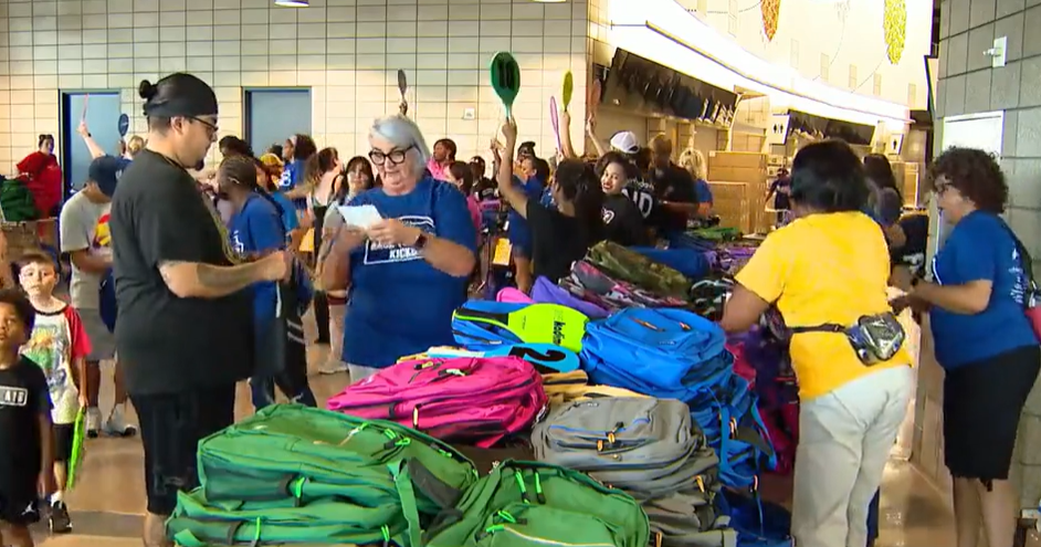 More than 9,000 Arlington ISD students receive free backpacks at back-to-school kickoff 