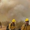 Crews rush to contain raging wildfires forcing evacuations in western states