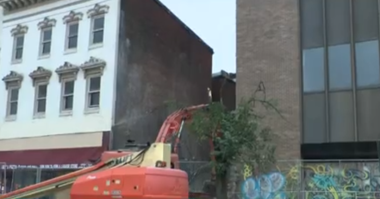 Leaning building in downtown Baltimore demolished, possible prior work done without permit 