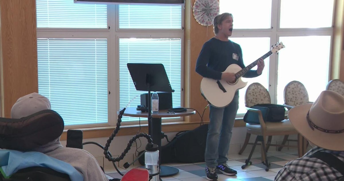 Former member of Boston rock band brings healing music to patients ...