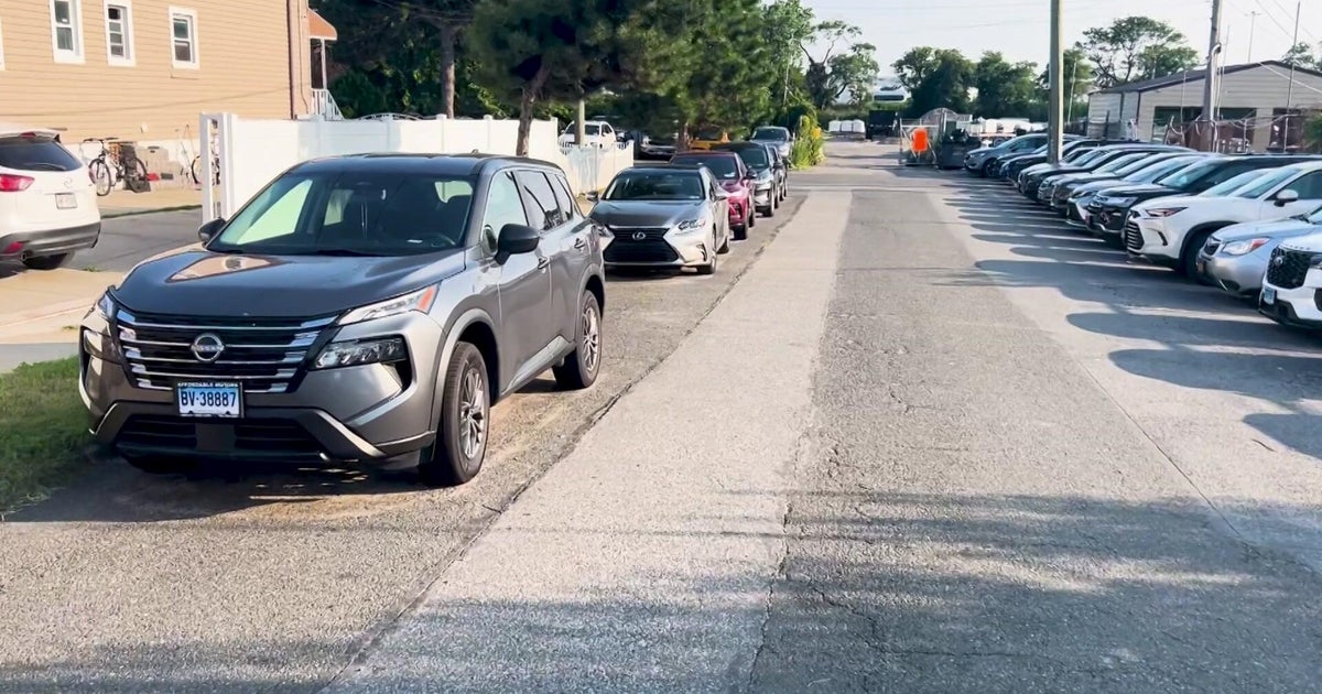 Queens residents say unofficial airport lots take up valuable street parking 