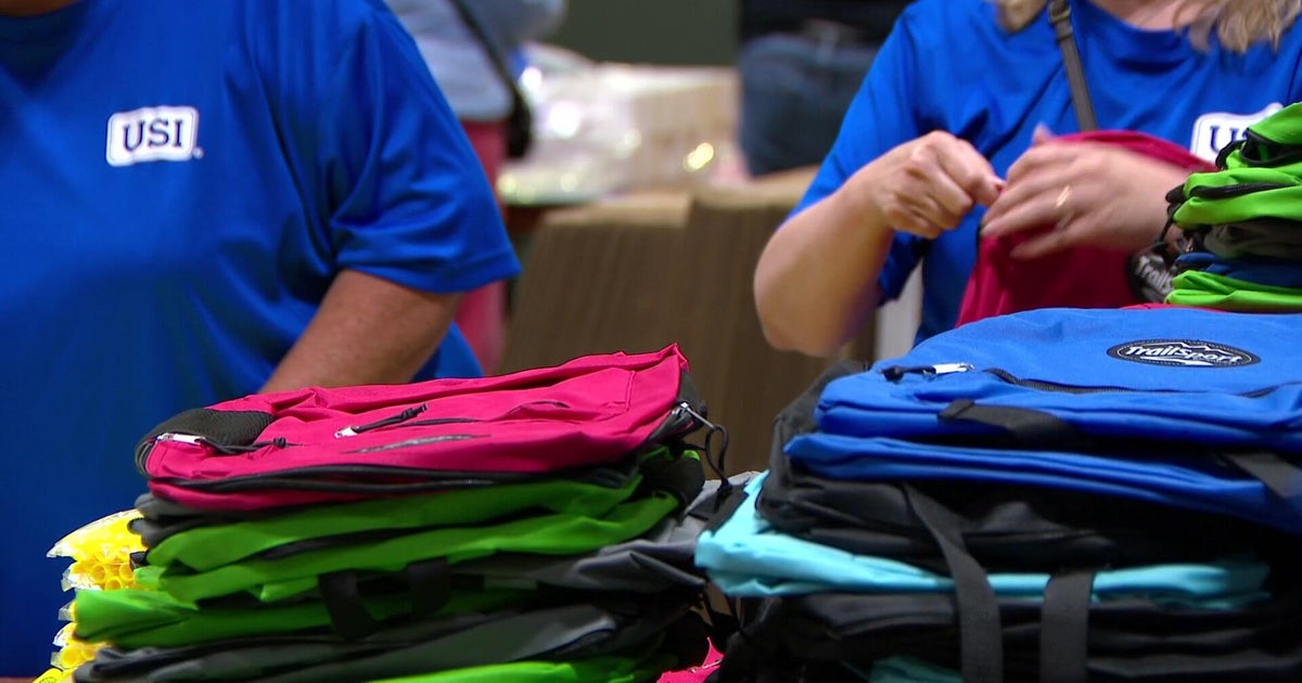 Volunteers fill thousands of backpacks for Twin Cities students 