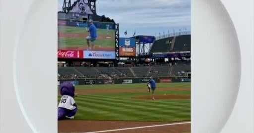 Rod Mackey throws out the opening pitch at Coors Field - CBS Colorado