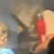 Video shows smoke from a burning battery pack filling airplane cabin midflight