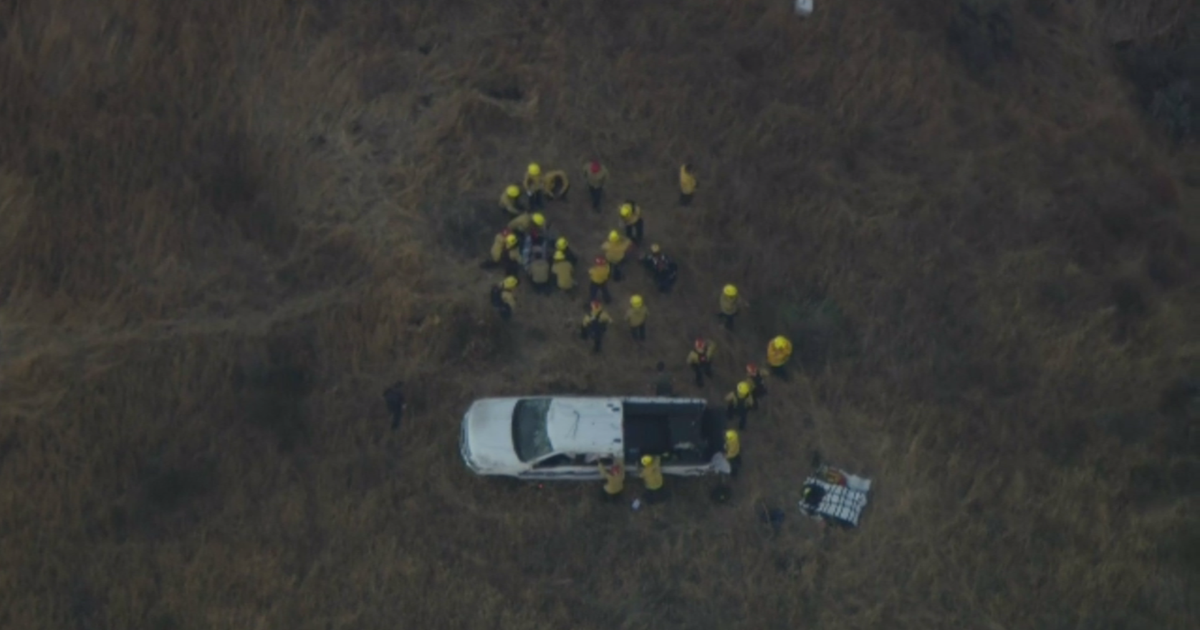 Firefighter suffers major injuries after truck rolls nearly 200 feet down hillside near Canyon Fire 