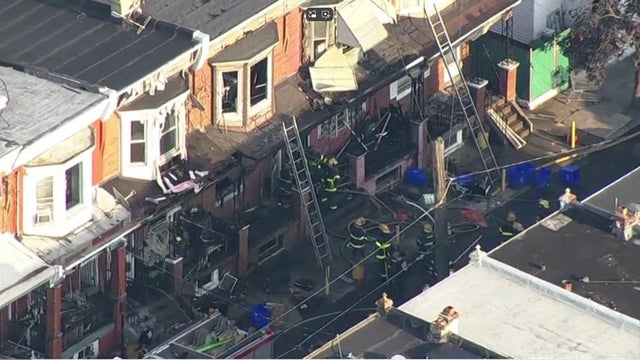 Rowhomes damaged in a fire on Reach Street in Kensington, firefighters are still on the scene 
