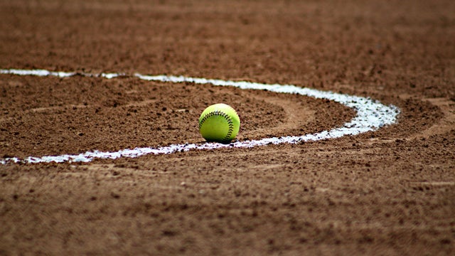 The baseball fell right over the sidelines during a practice game on the field one morning,Indonesia 