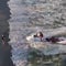 Watch: Crews on jet skis rescue swimmers in distress