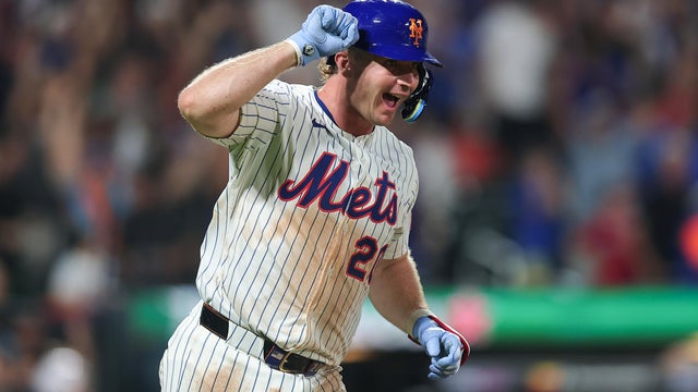 Pete Alonso #20 of the New York Mets reacts after hitting a solo home run during the sixth inning of the game against the Atlanta Braves at Citi Field on August 12, 2025 in New York City. 